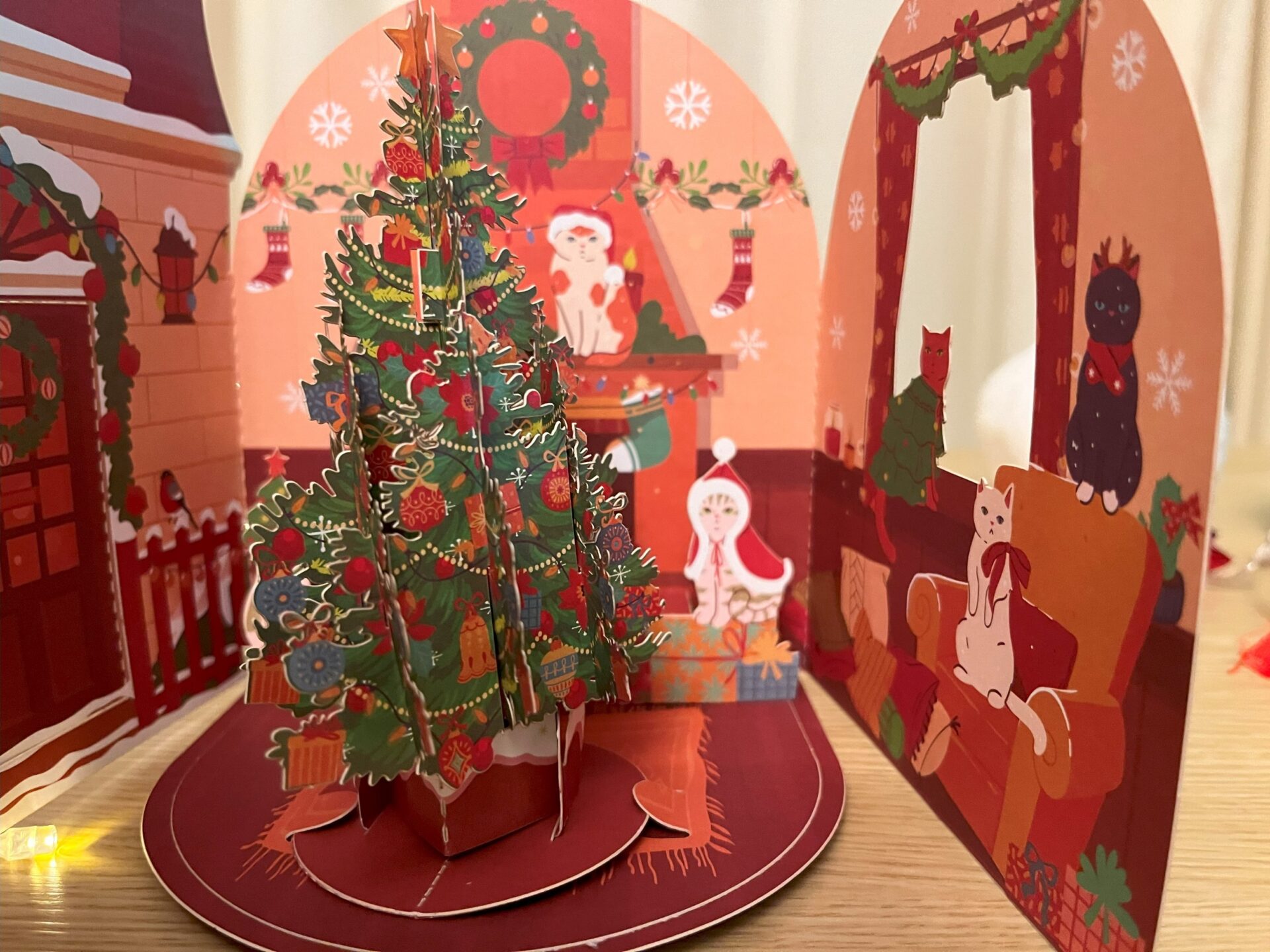 3D POP UP CATS AROUND A XMAS TREE CARD CLOSE UP 3D pop up cats around a Christmas tree card