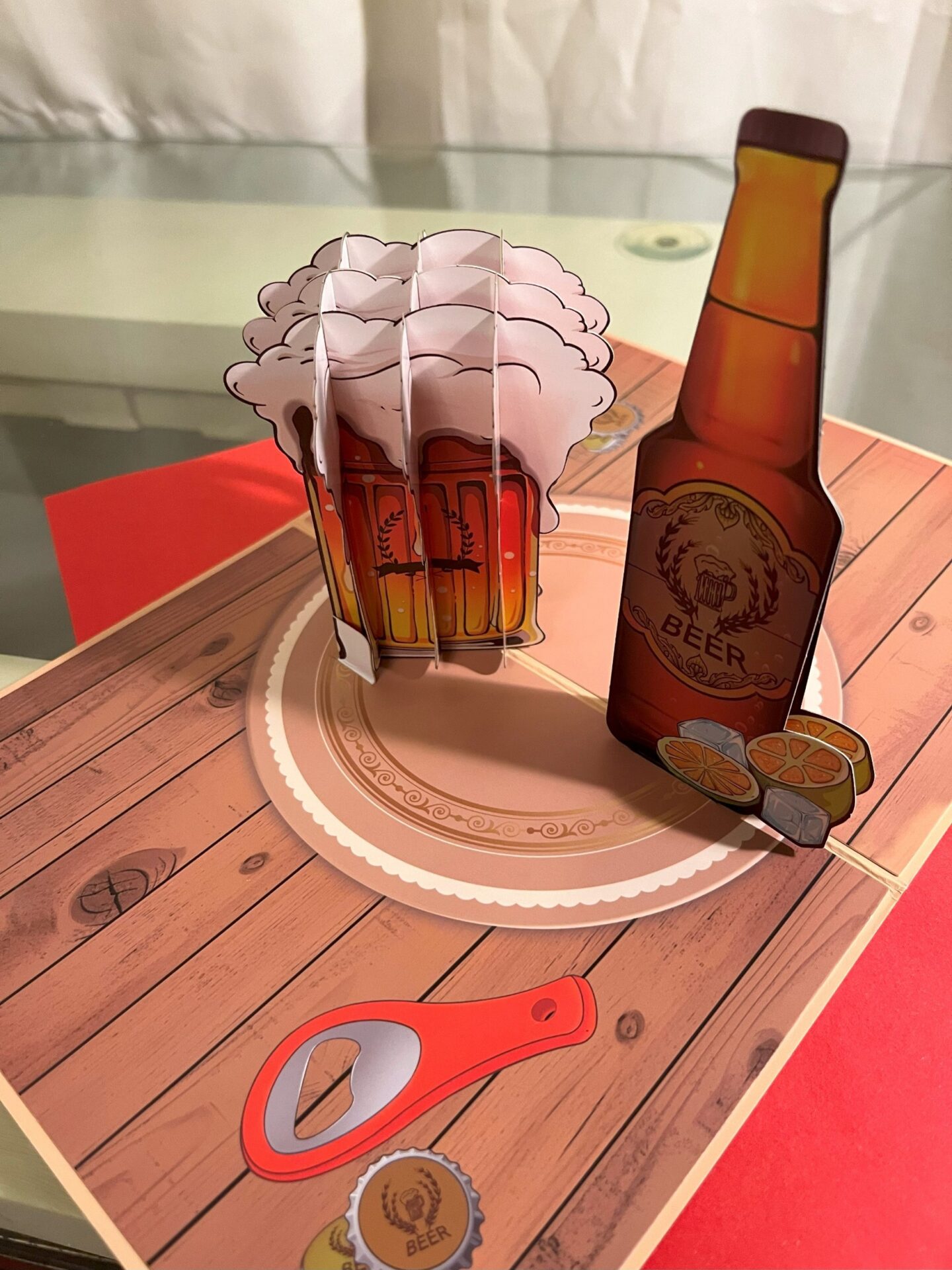 3D POP UP BEER AND LIME CARD Pop up 3D pint of beer card and a slice of lime - perfect card for Father's Day Please allow 2-3 days for postage. ABOUT YOUR GREETING CARD Your high quality pop-up greeting card is a multi-layered, 3D pop up pint of beer with a bottle of beer with a piece of lime in it. Your card will expand when your loved one opens it. Your greeting card is carved by an automatic laser-cutting machine to ensure every detail is perfect. This eye-catching design will be an instant ‘wow’ when that special person in your life opens it. This card is perfect as a Father's Day card as it has been left blank for your own personal message. The price of the card also includes an envelope. Specifications: Material: Paper and card Card size: 20 cm x 15 cm Please let me know when you order, when you require your card by. Thank you. Please note that I used to make cake toppers, hence the name - Countryside Cake Creations. However, due to a life changing illness, I am no longer able to do this, and am now selling these ready made cards on-line, which can be personalised at no extra cost to you. Benefits of this fantastic 3D pop-up card Price includes postage and packaging within the United Kingdom A unique card and gift in one A personalised card for your loved one Suitable for lots of different occasions Separate card or space on the card to write your special personalised message Sturdy envelope Sealed in a resealable transparent water-proof cellophane bag. Orders sent by Royal Mail’s First Class post, ensuring a speedier delivery Orders posted straight-away Your card fits through your letterbox and doesn’t require your signature on delivery Delivery of your card within 2-3 working days – subject to Royal Mail
